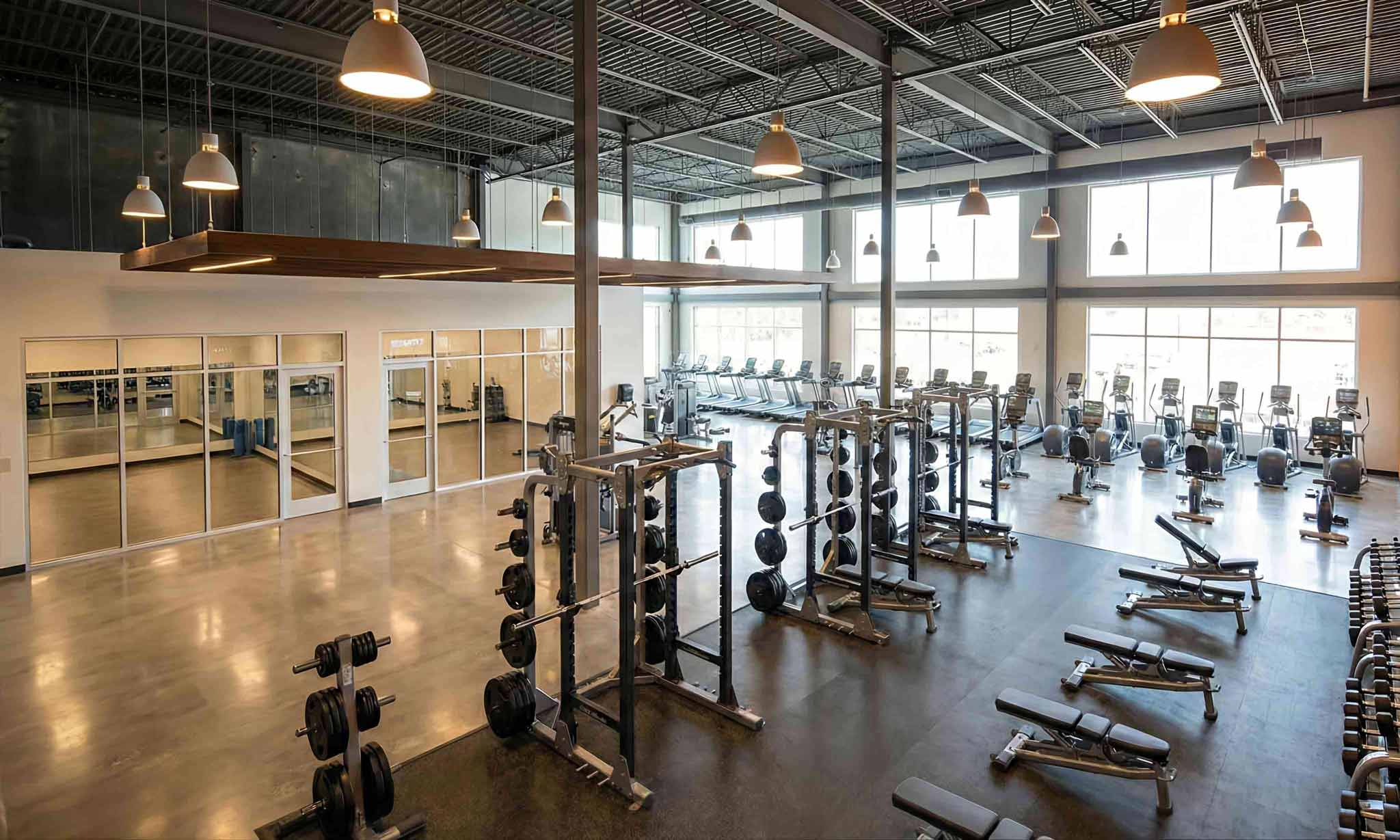 Self-powered Leadman fitness equipment in a hotel gym, demonstrating installation without electrical retrofits and promoting energy efficiency